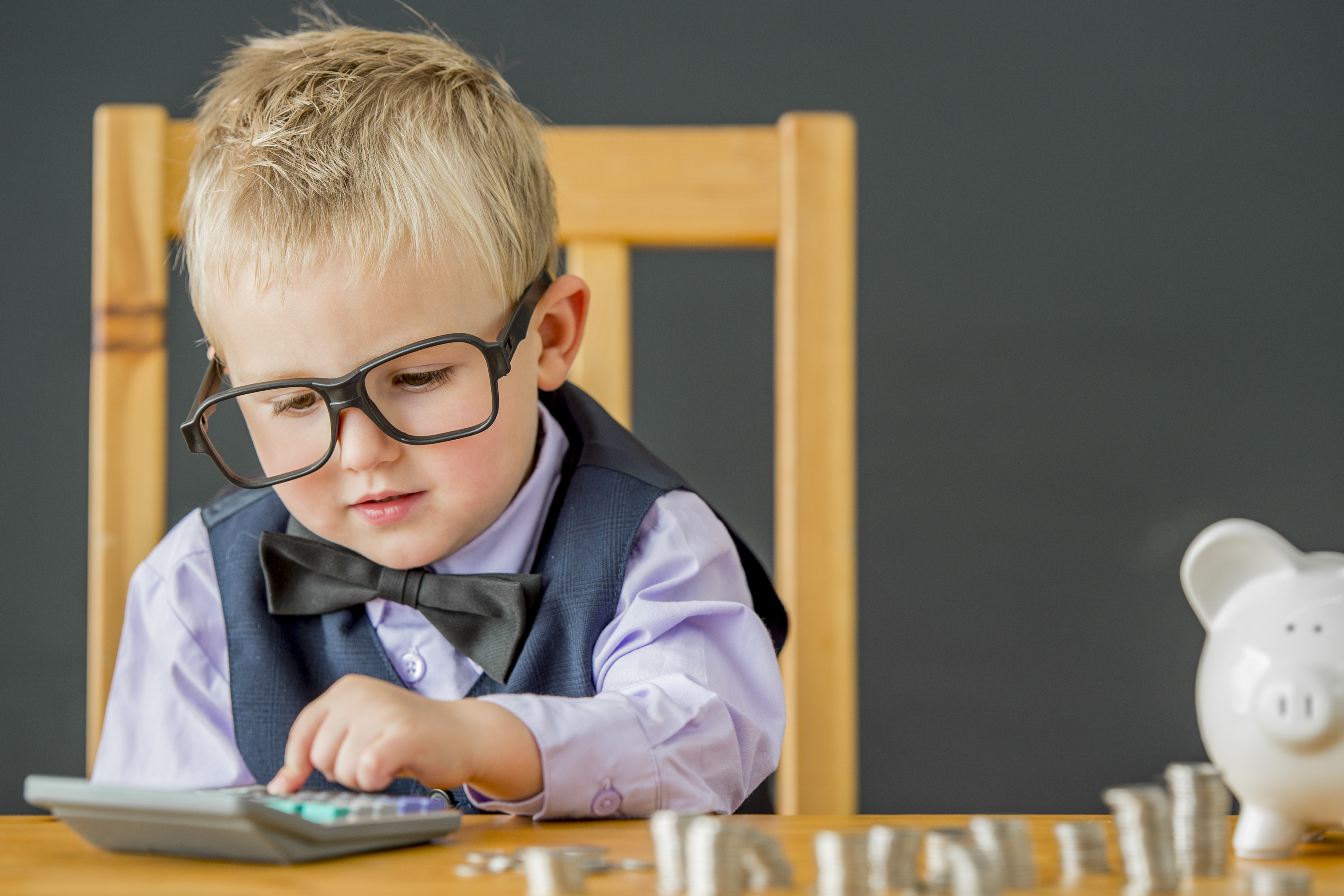 Little Boy Using a Calculator